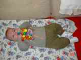 Marko playing with his rattle