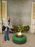 Lilly warming her hands